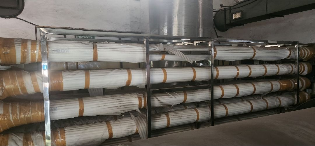 RO skid with membrane housings wrapped for delivery – PureFlux Engineering, Chennai