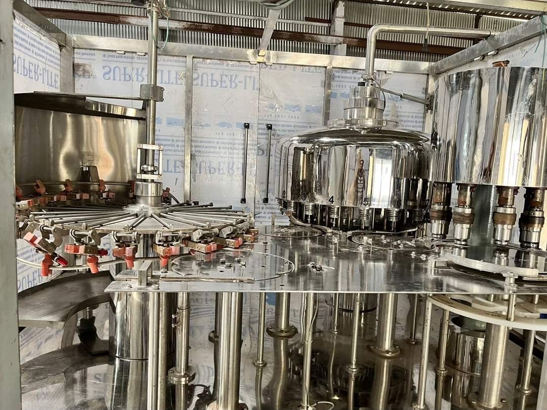 Inside a rotary rinsing, filling and capping machine – PureFlux Engineering, Chennai