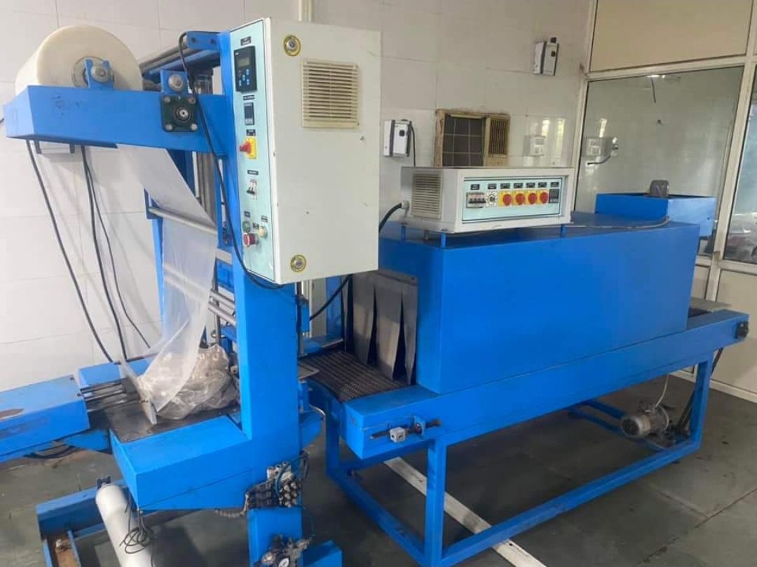 Semi-automatic shrink wrapping machine – PureFlux Engineering, Chennai